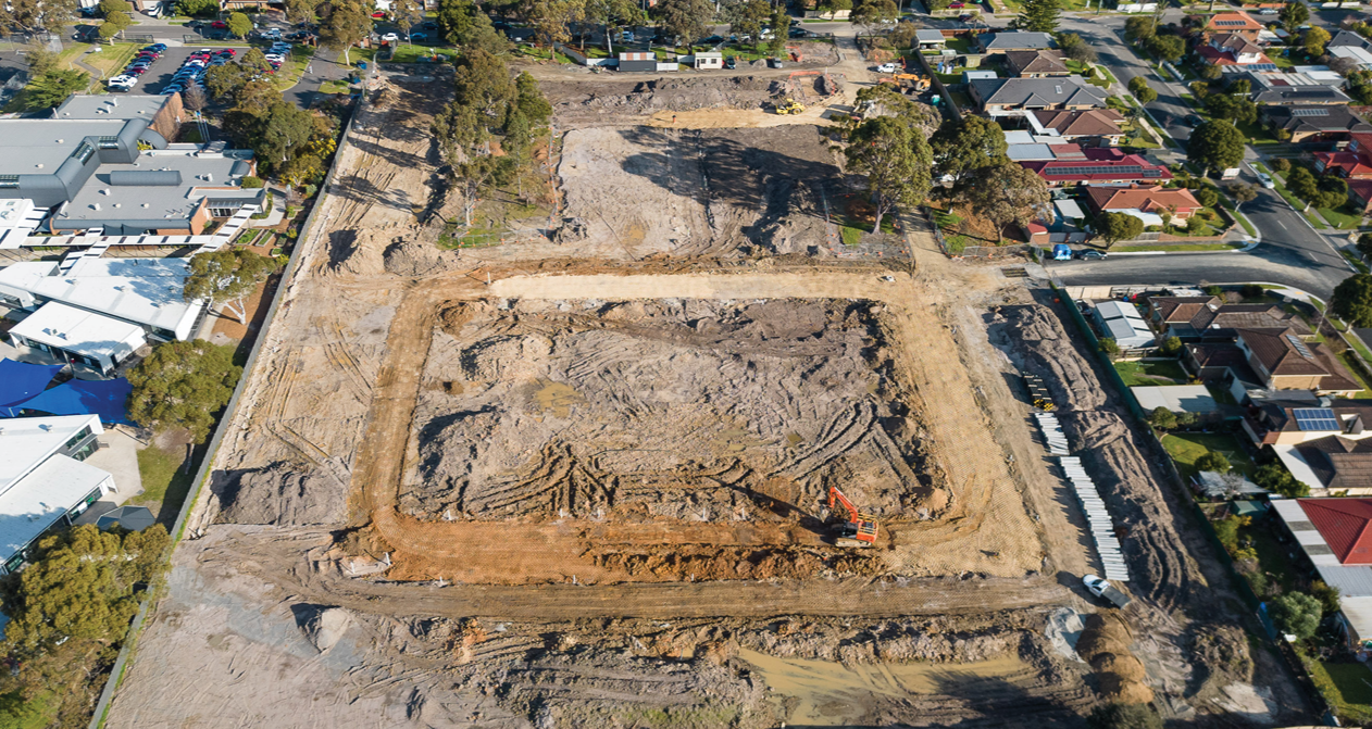 Civil works - a dirt square with a excavator at Coomoora