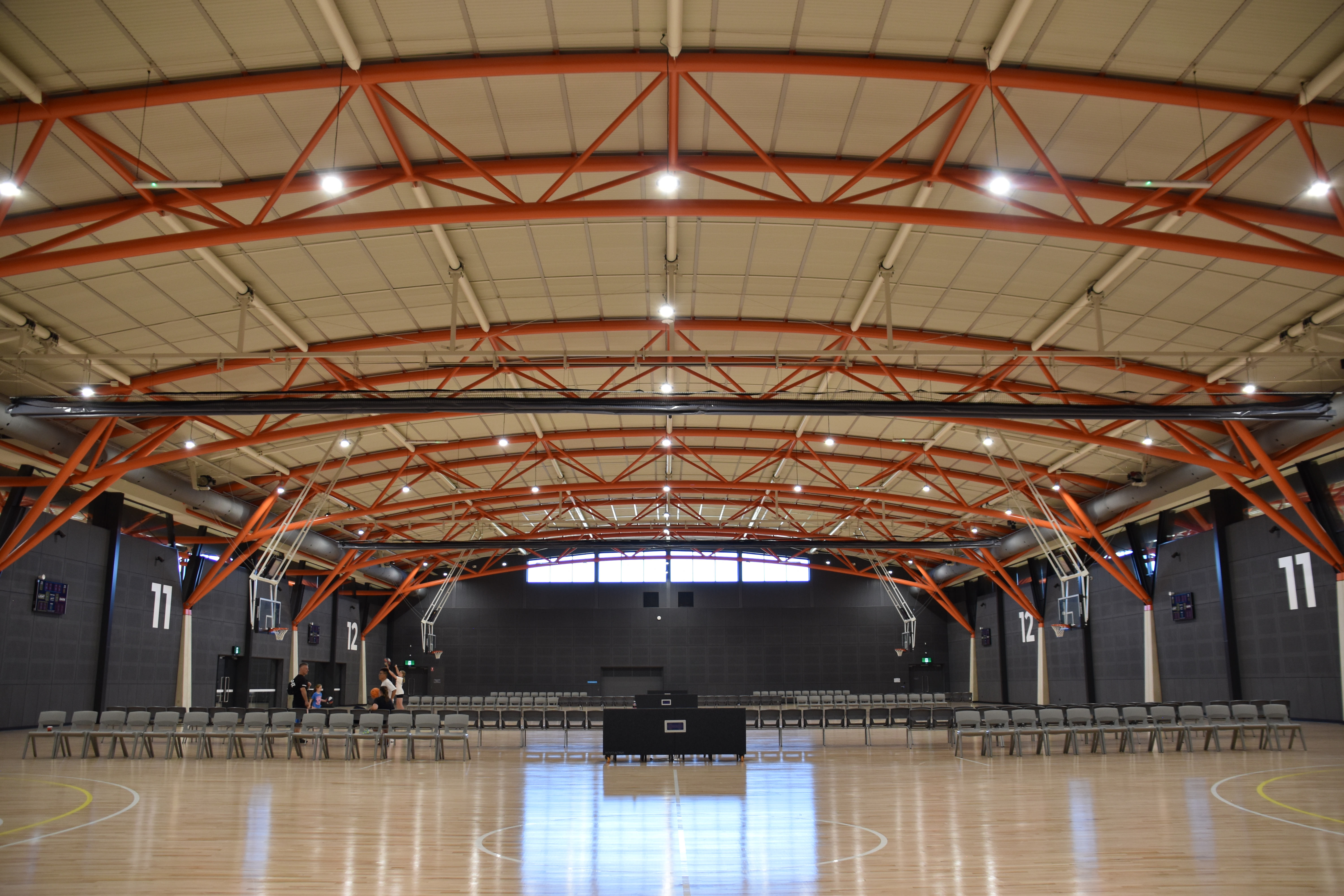 Multipurpose courts with rings, nets and seating