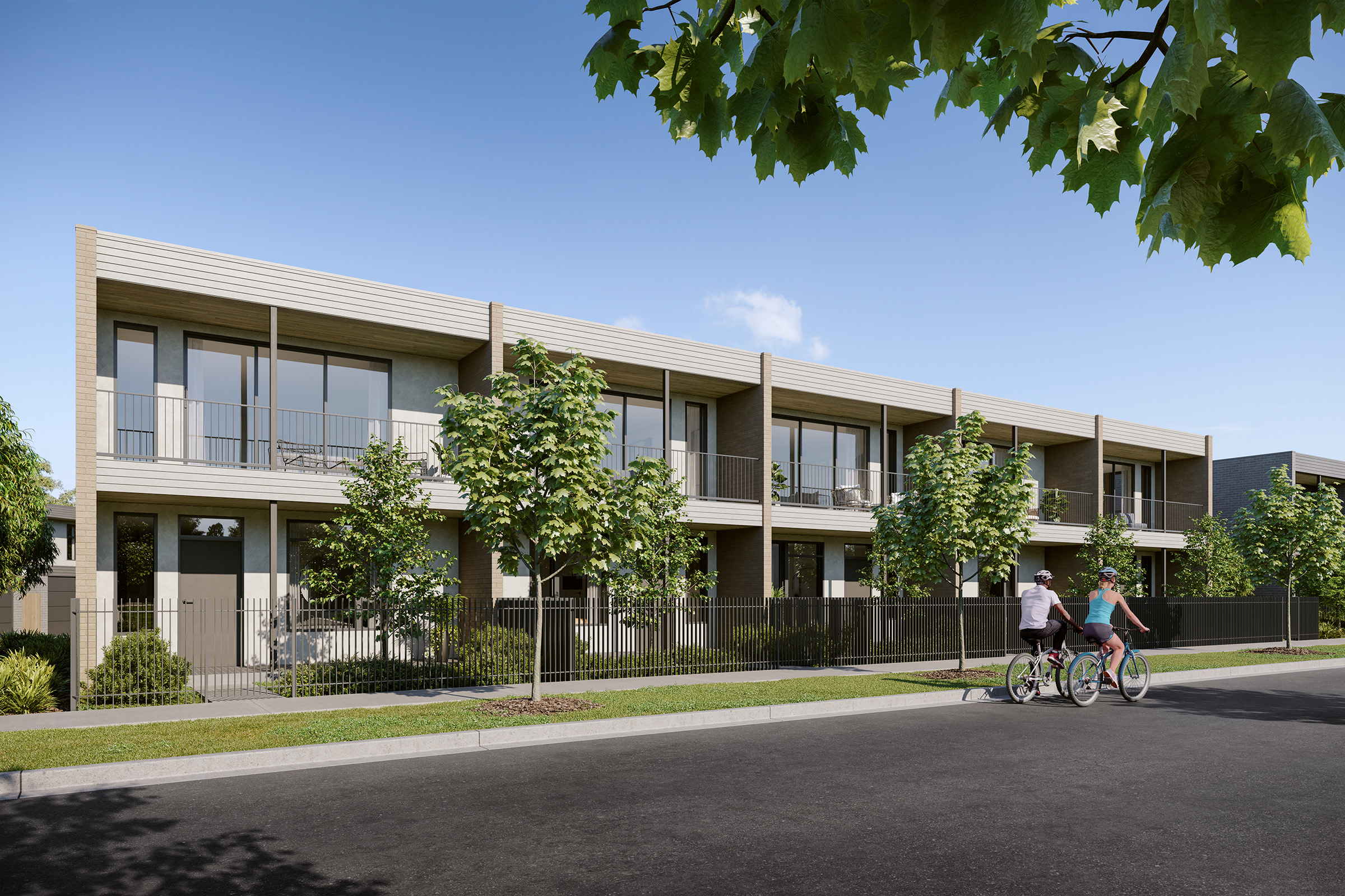 Artist impression - townhouses facing a street with two people riding bikes out the front 